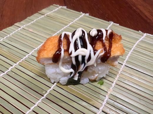 Salmon nigiri with mayo and teriyaki drizzle