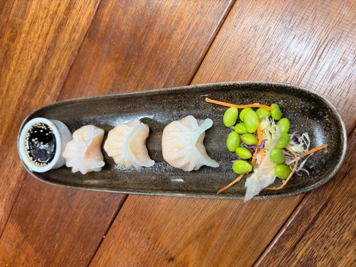 Gyoza dumplings with edamame and dipping sauce