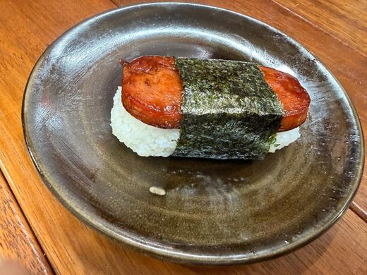 Spam musubi on a ceramic plate
