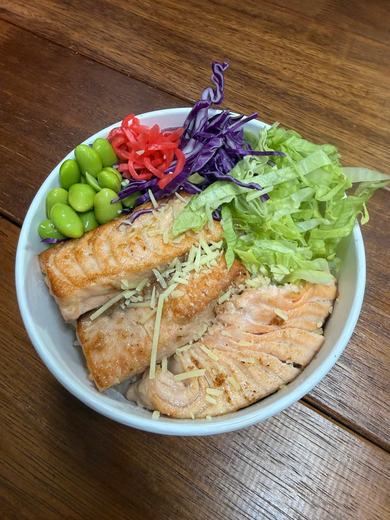 Grilled salmon rice bowl with edamame
